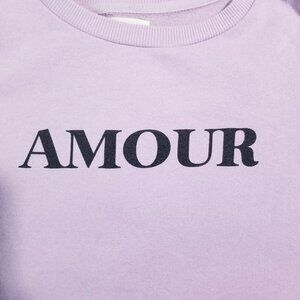 Cotton On purple crewneck sweatshirt with the word "AMOUR"; Size: Small.
